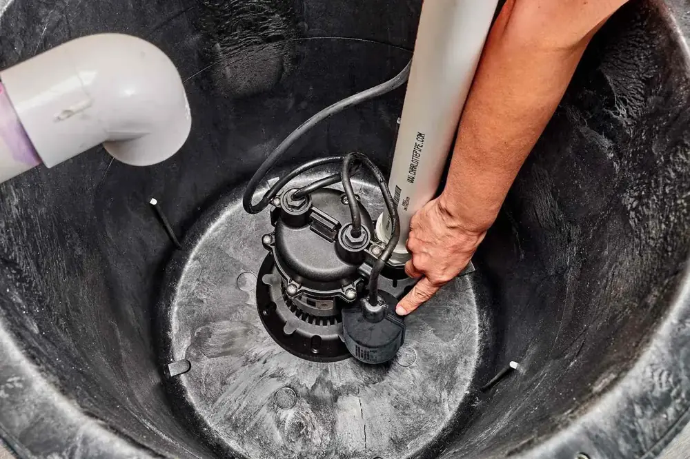 Residential plumbing pump equipment being serviced